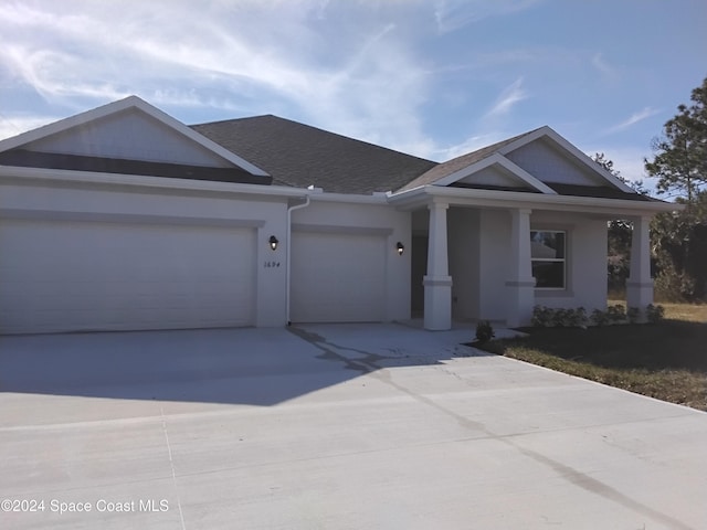 view of front of home featuring a garage