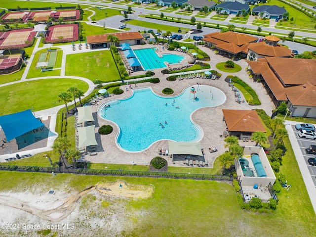 birds eye view of property with a residential view