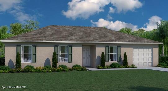 view of front of property with a garage and a front lawn