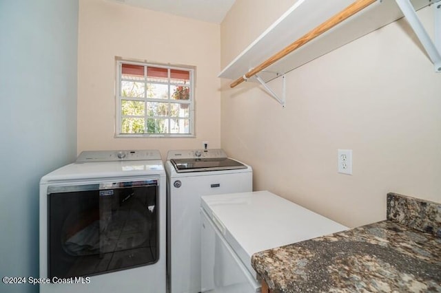 laundry area featuring independent washer and dryer