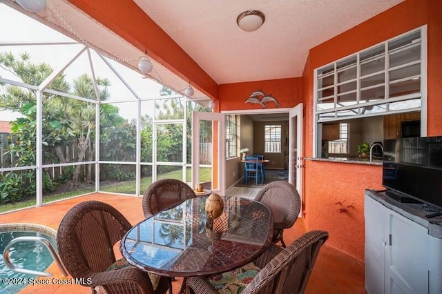 sunroom / solarium with sink