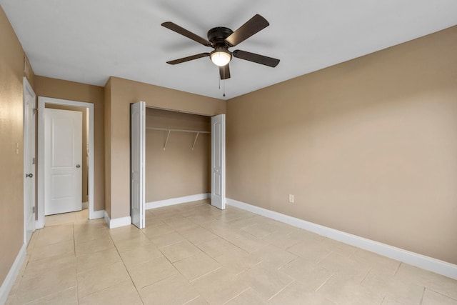 unfurnished bedroom with a closet, light tile patterned floors, and ceiling fan