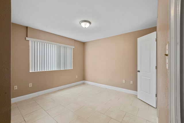 view of tiled spare room