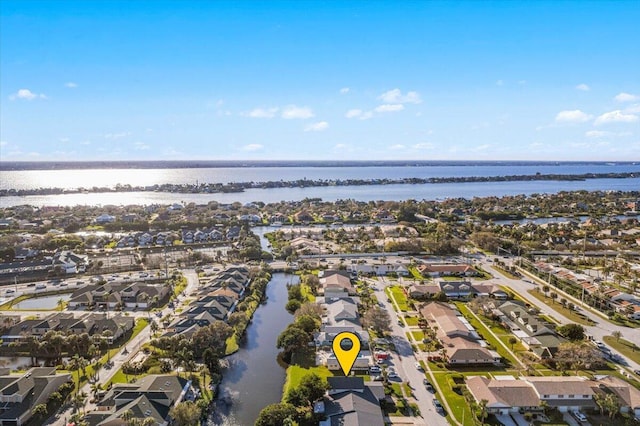 bird's eye view with a water view