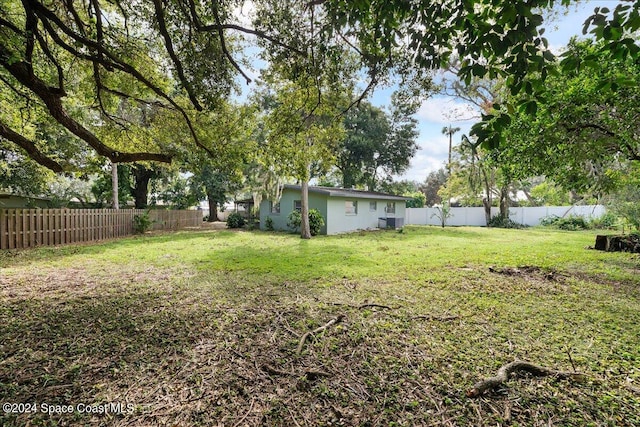 view of yard featuring central AC