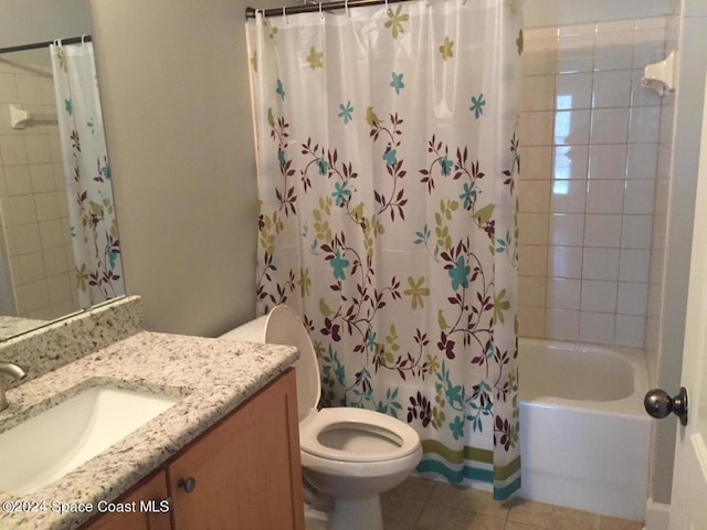 full bathroom with tile patterned flooring, vanity, shower / bath combo, and toilet