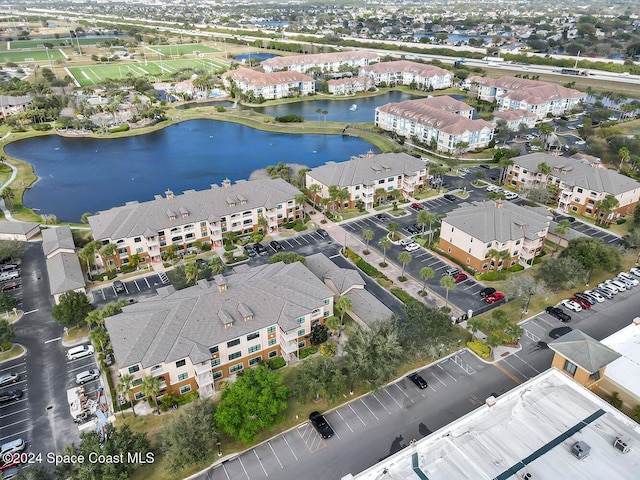 drone / aerial view with a water view