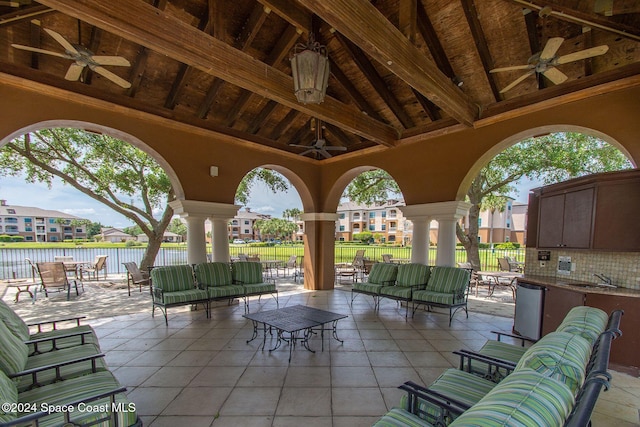 6470 Borasco Dr Unit 1108, Melbourne, FL 32940 - view of patio with a ceiling fan, an outdoor living space, a water view, a residential view, and outdoor dining area