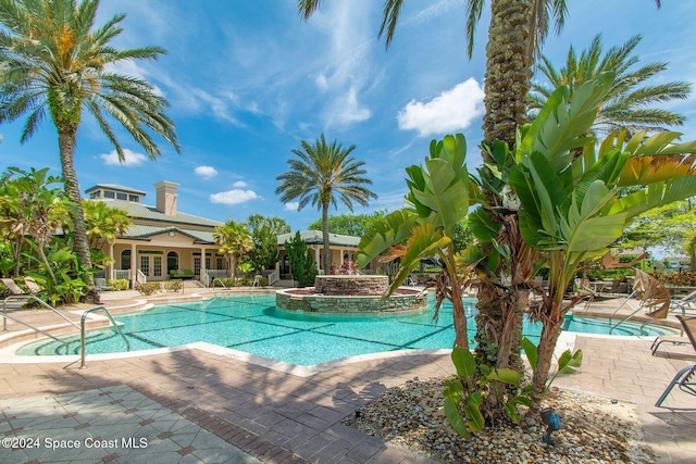 6470 Borasco Dr Unit 1108, Melbourne, FL 32940 - community pool with a patio