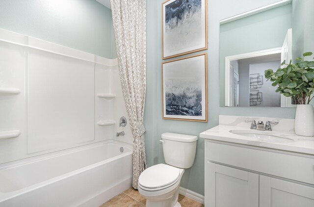 full bathroom featuring vanity, shower / bath combo, toilet, and tile patterned floors