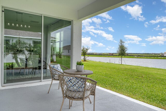 view of patio / terrace featuring a water view