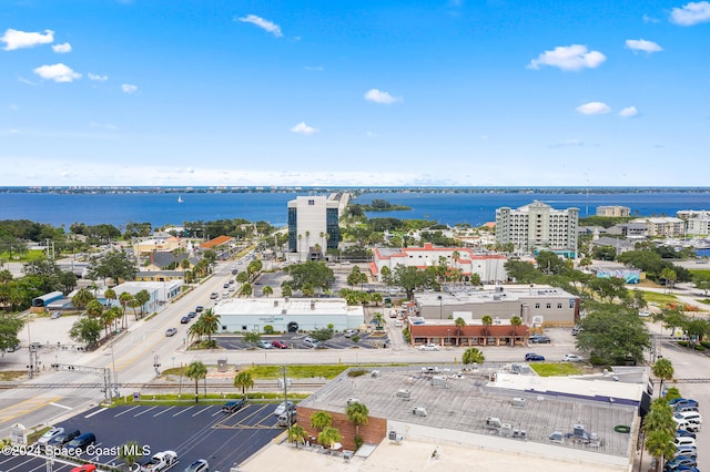 drone / aerial view with a water view