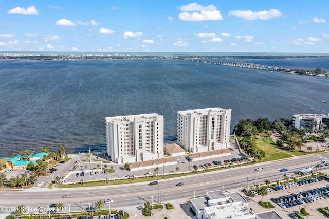 birds eye view of property featuring a water view