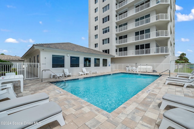 view of pool featuring a patio area