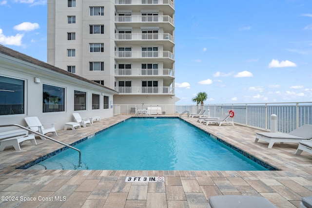 view of pool with a patio area