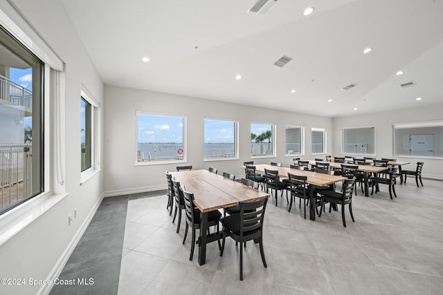 dining space with light tile patterned floors