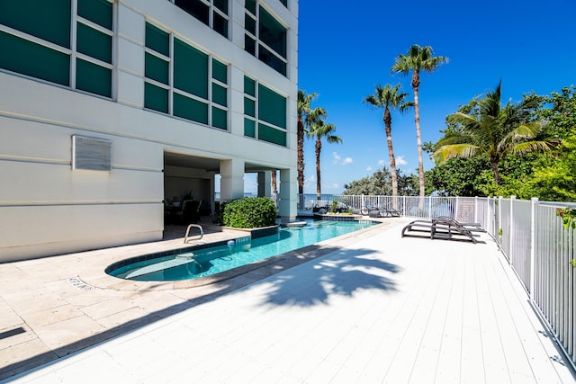 view of pool featuring a patio