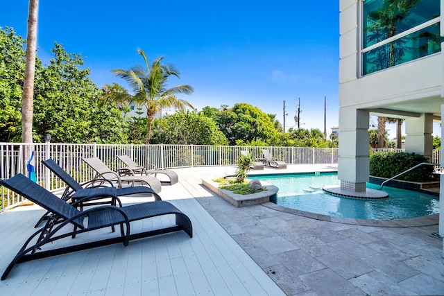 view of pool featuring a patio area