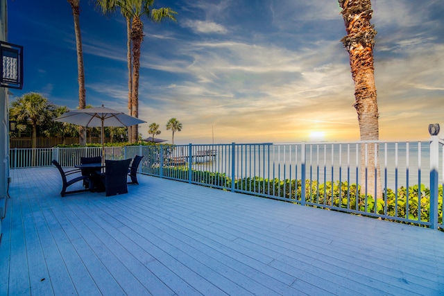 deck at dusk with a water view