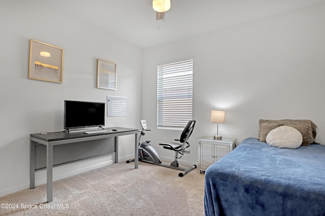 bedroom featuring ceiling fan and carpet flooring