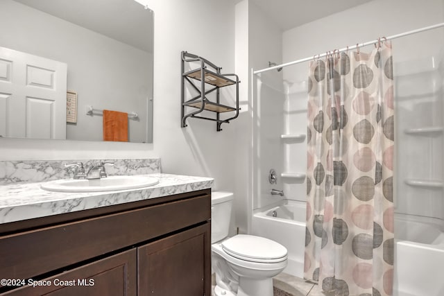 full bathroom featuring vanity, toilet, and shower / tub combo with curtain