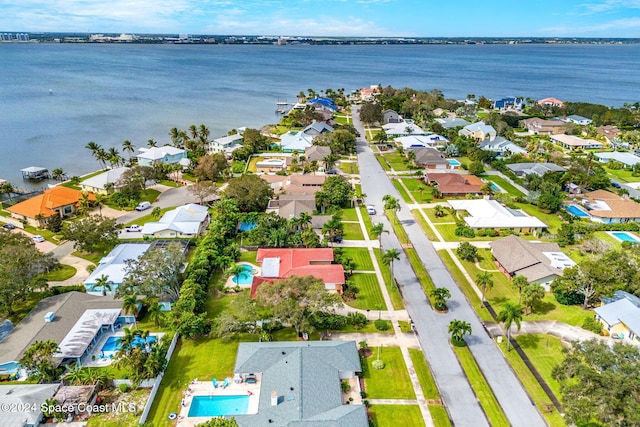 birds eye view of property featuring a water view