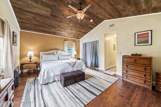 bedroom featuring ceiling fan, dark wood-type flooring, lofted ceiling, wood ceiling, and ornamental molding