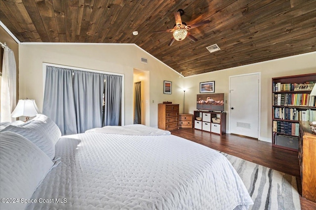 bedroom with dark hardwood / wood-style floors, ceiling fan, wood ceiling, and vaulted ceiling