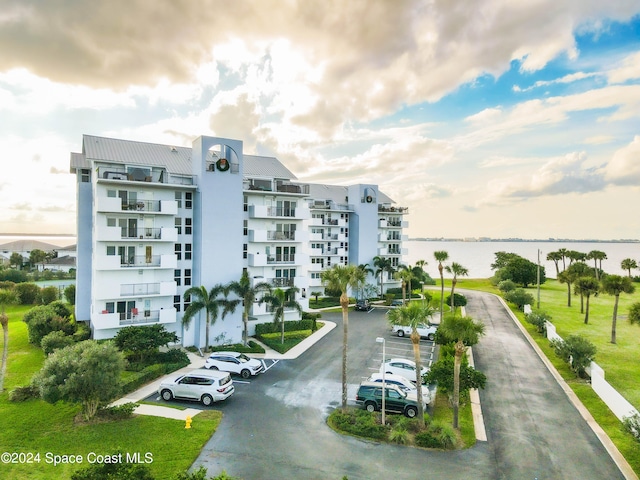 view of property with a water view