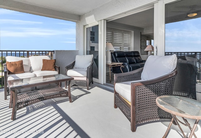 balcony with an outdoor hangout area