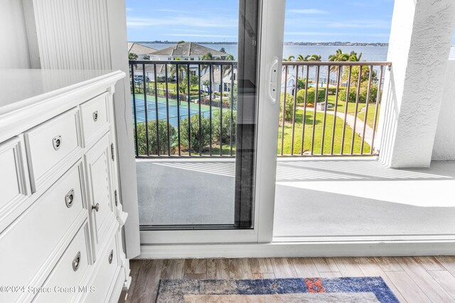 balcony featuring a water view