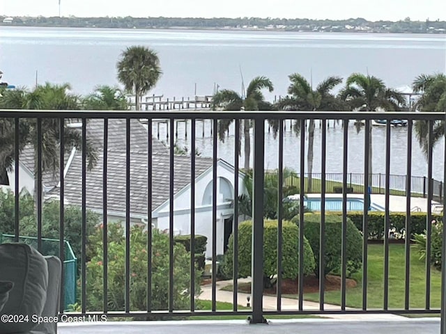 view of gate with a water view