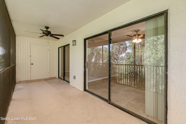 exterior space with ceiling fan