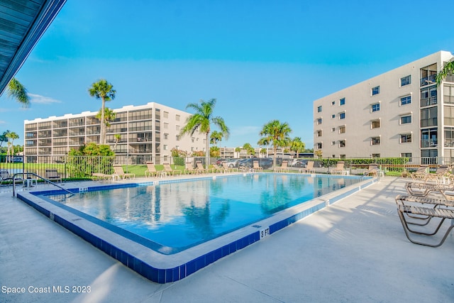 view of pool featuring a patio