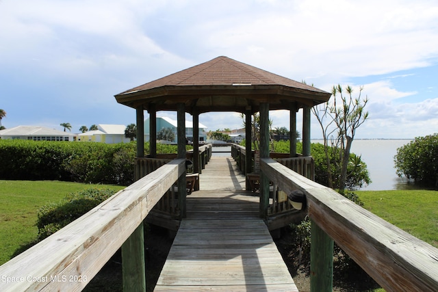 dock area with a water view and a gazebo