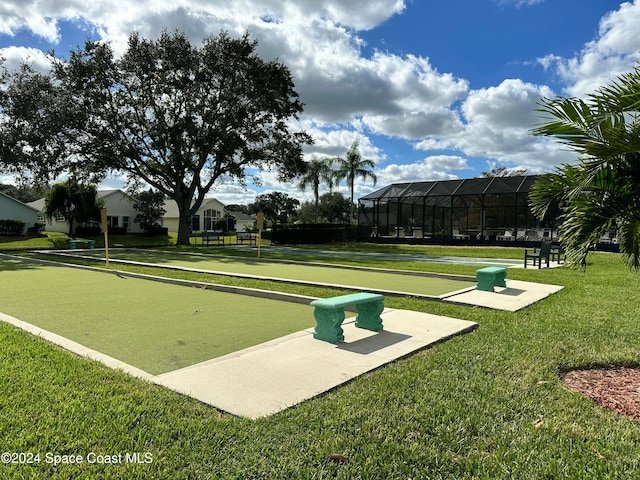 surrounding community featuring a lawn