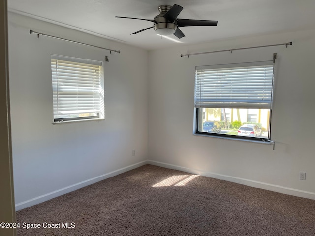 carpeted empty room with ceiling fan