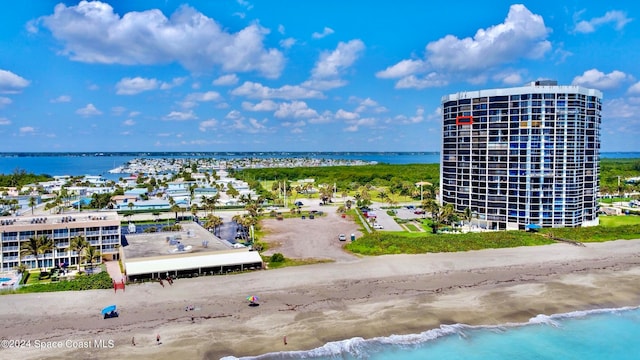 property view of water featuring a beach view