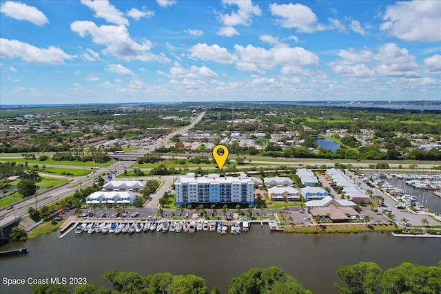 drone / aerial view featuring a water view