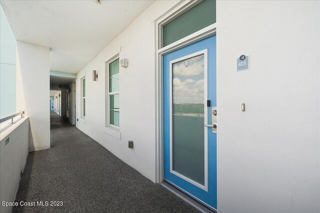202 Ivory Coral Ln Unit 405, Merritt Island, FL 32953 - entrance to property featuring stucco siding