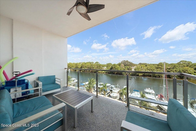 202 Ivory Coral Ln Unit 405, Merritt Island, FL 32953 - balcony with a water view, a ceiling fan, and an outdoor living space
