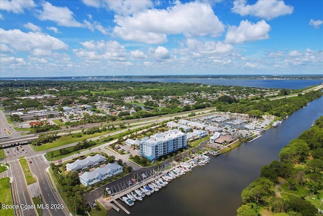 drone / aerial view with a water view