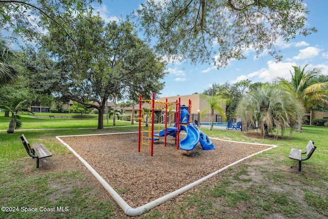 view of play area featuring a yard