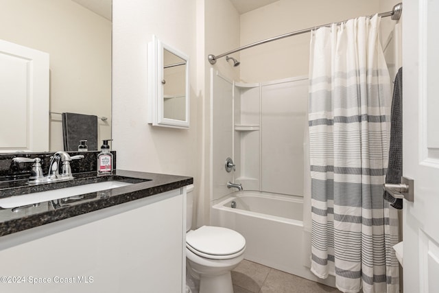 full bathroom featuring vanity, shower / bath combo, toilet, and tile patterned floors