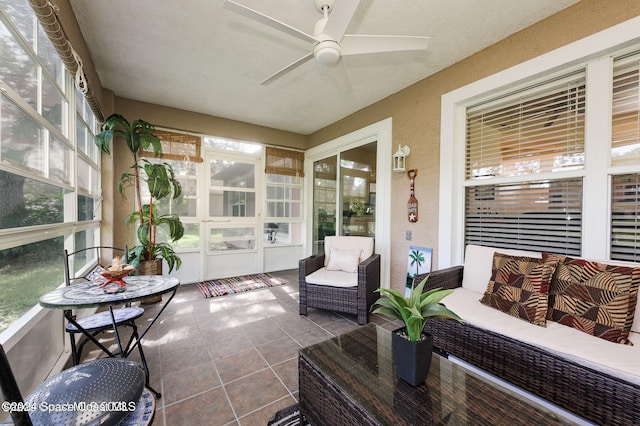 sunroom / solarium with ceiling fan and plenty of natural light