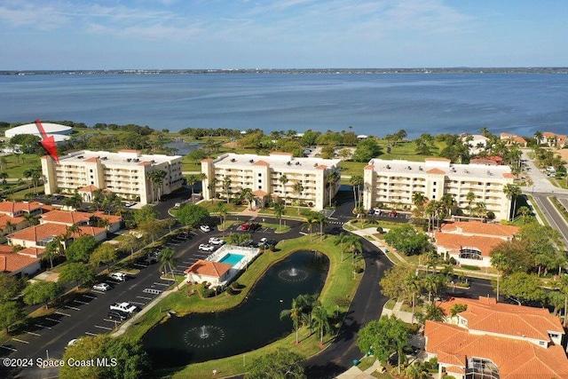 drone / aerial view featuring a water view