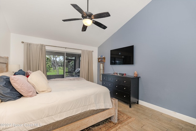 bedroom featuring high vaulted ceiling, light hardwood / wood-style flooring, and ceiling fan