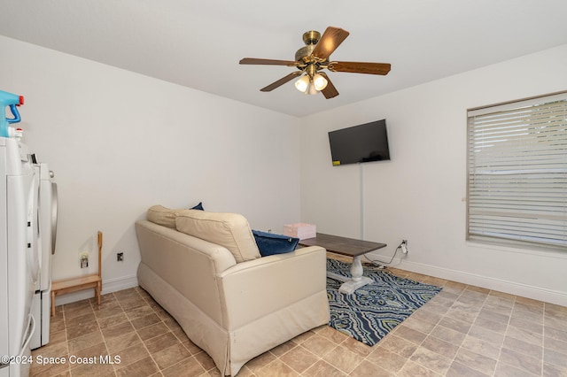 living room with ceiling fan