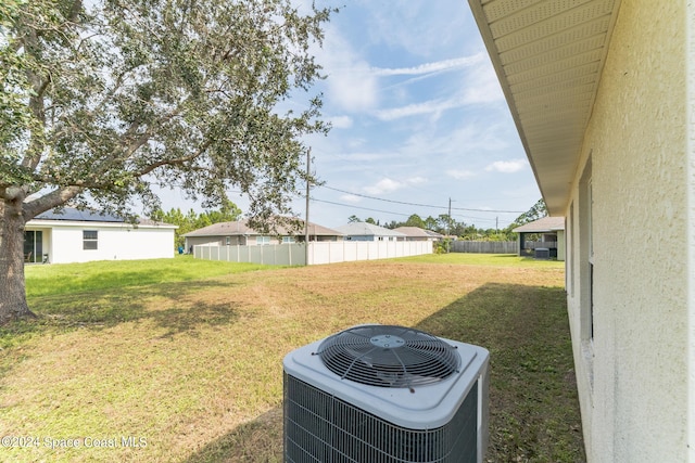 view of yard with central AC