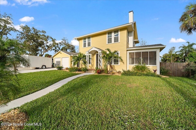 colonial-style house with a front lawn and a garage